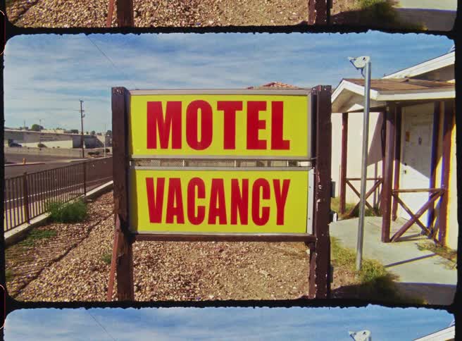 Sign at an establishment next to a highway