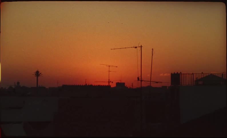 Urban silhouette landscape with a reddish sky