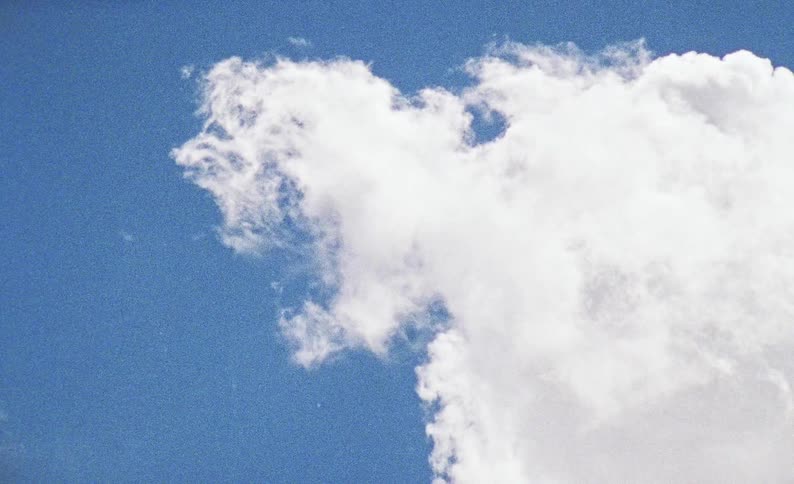 A view of some puffy white clouds