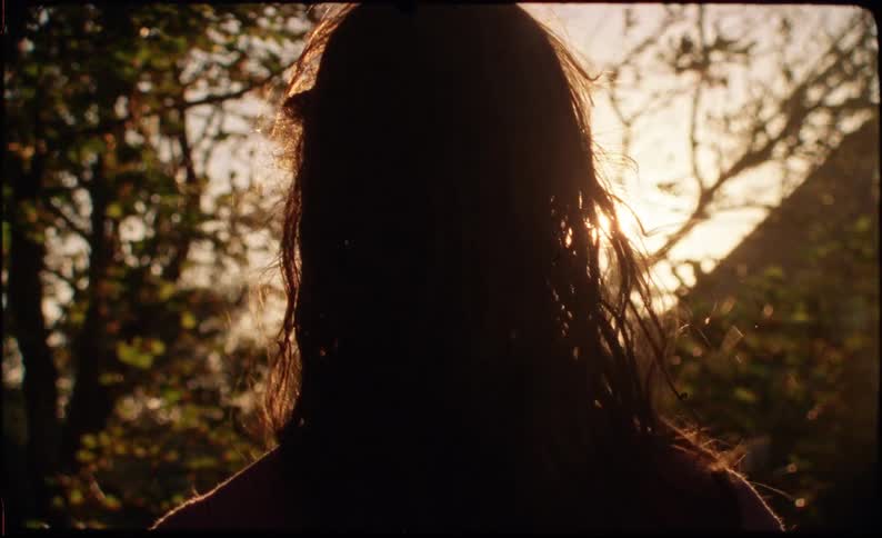 A woman standing outdoors