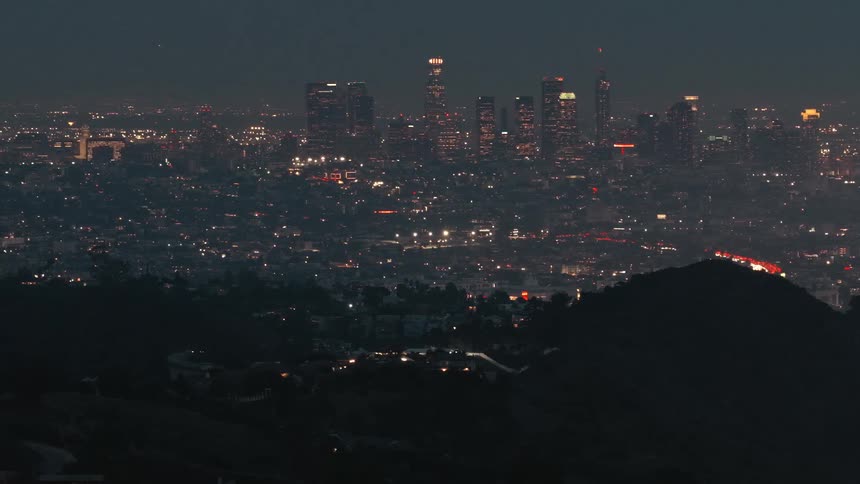 Fog covers the city at night