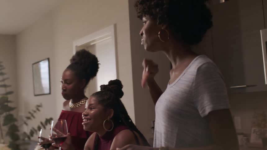 Women talk together and drink