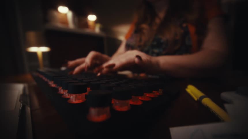 Pair of hands typing on a computer keyboard