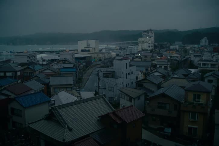 A city by the water at dusk