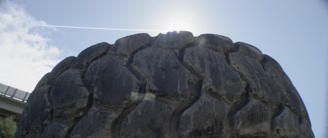 View of a very large tire on a sunny day