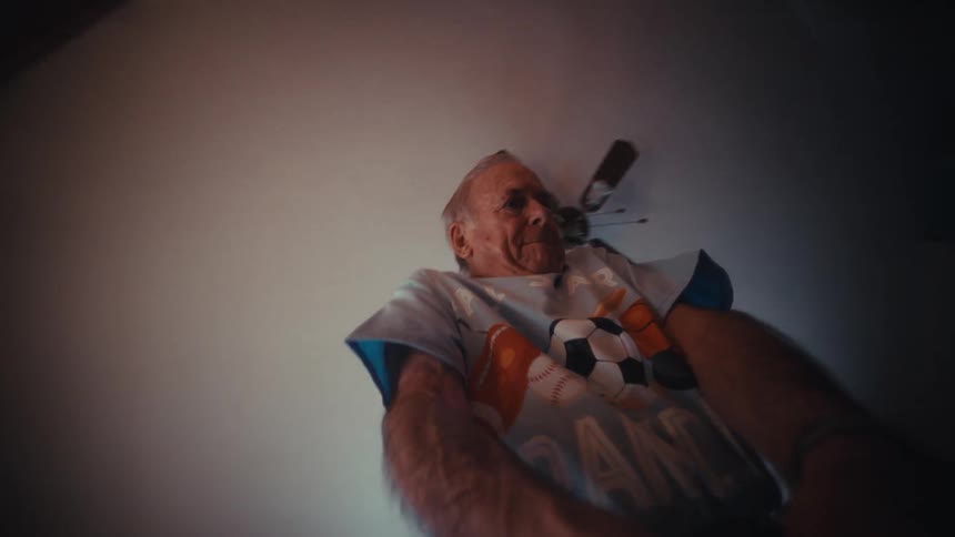 Looking up at an elderly man