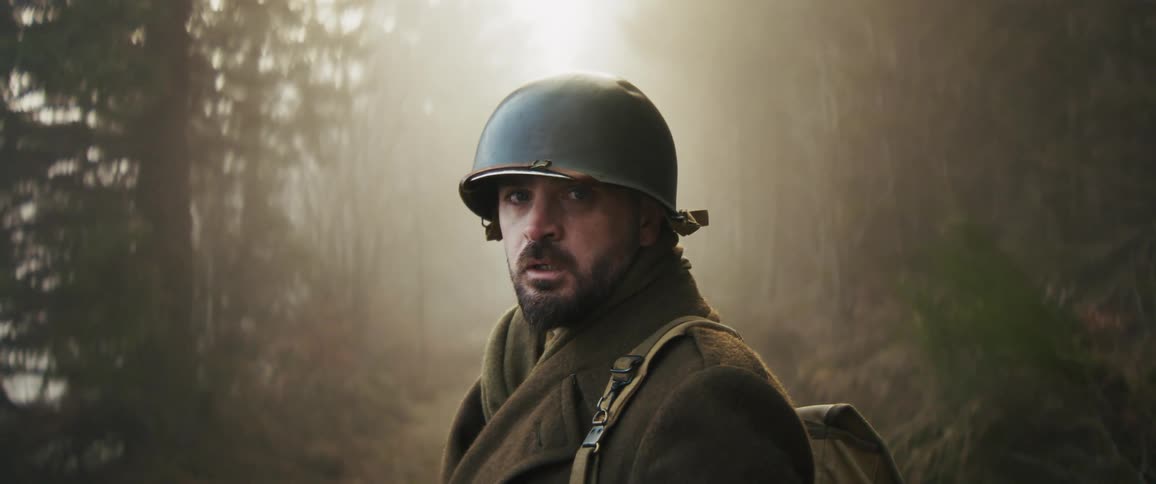 A soldier out in a forest