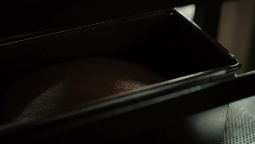 A tray of ingredients is slid in the rack