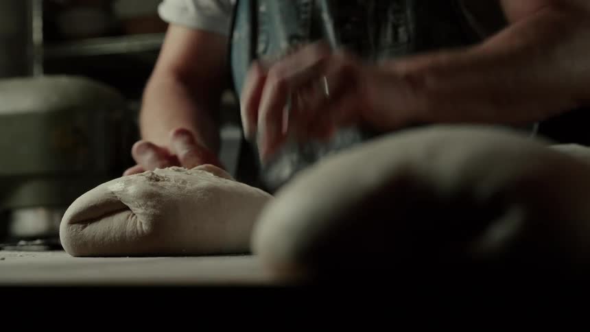Person preparing bread dough