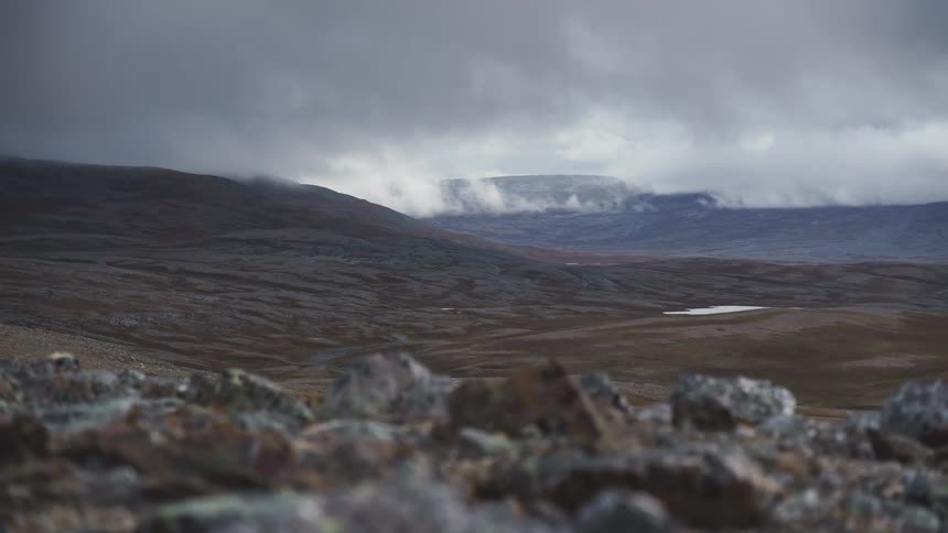 The clouds flow over the landscape