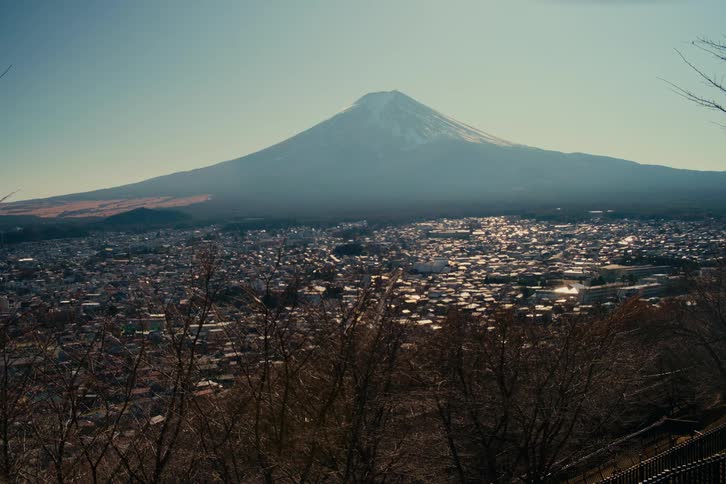 Rural city with a mountain on the background outdoors during day time