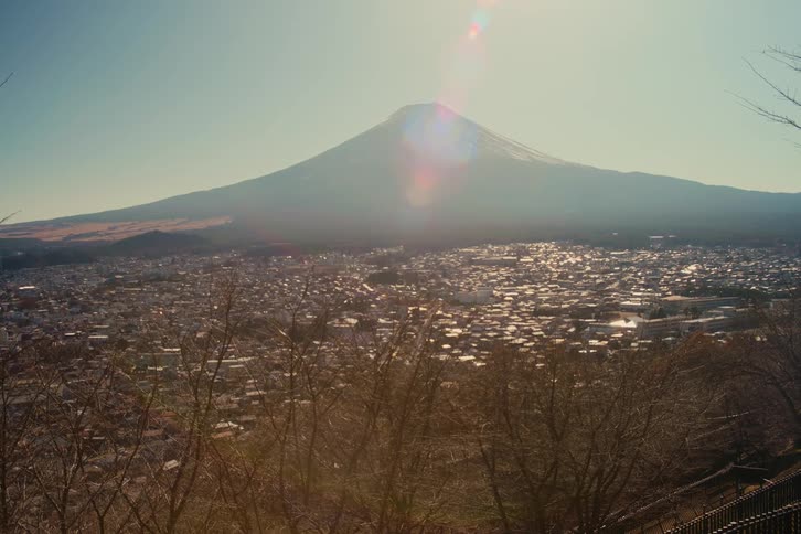 Rural city next to a mountain outdoors during day time