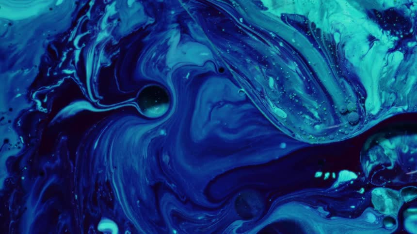 Blue ink in different shades in motion