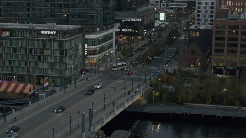Vehicles drive over the bridge in the city