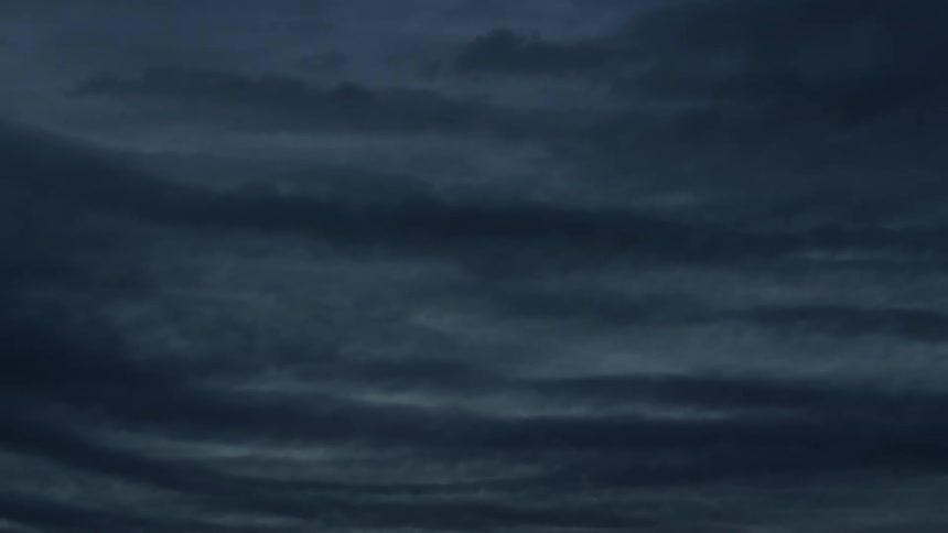 Dense clouds cover the sky in a continuous formation
