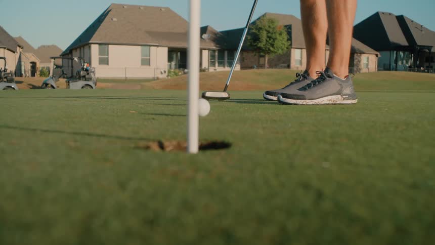 A person playing golf