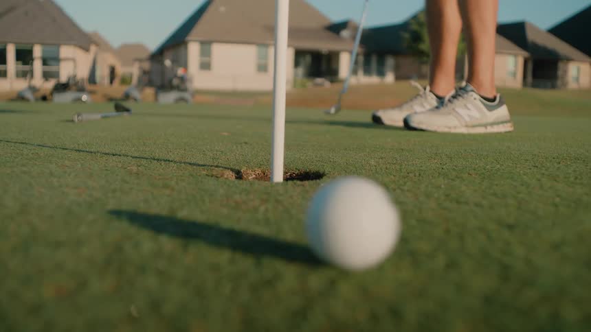 Person misses golf target