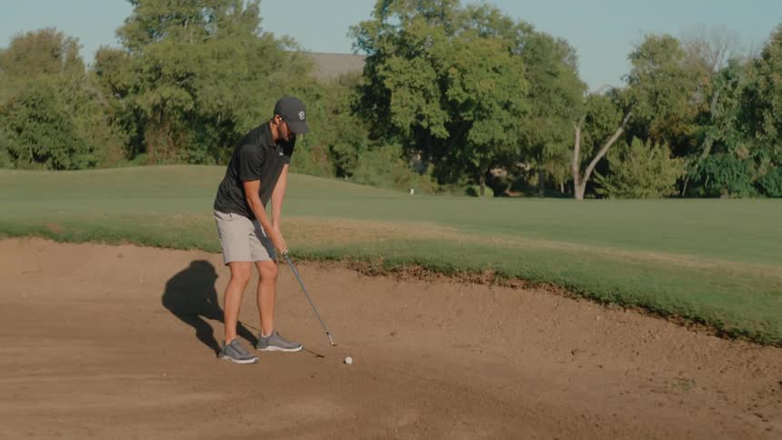 Man executing a golf swing