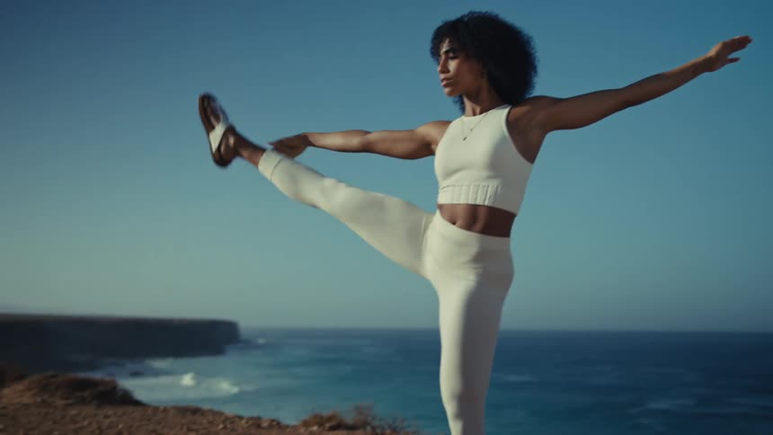 A woman dancing outdoors on a sunny day