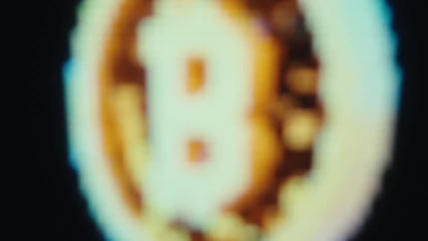 Bitcoin symbol displayed on a digital screen composed of luminous pixels