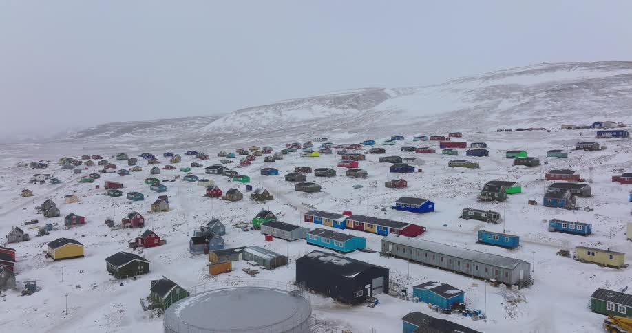 An aerial view of a remote area covered in snow