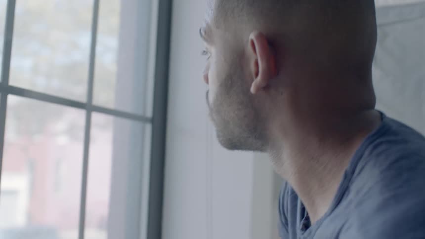 A man cleans a window