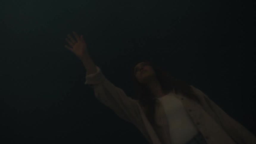 A portrait of a woman in a room