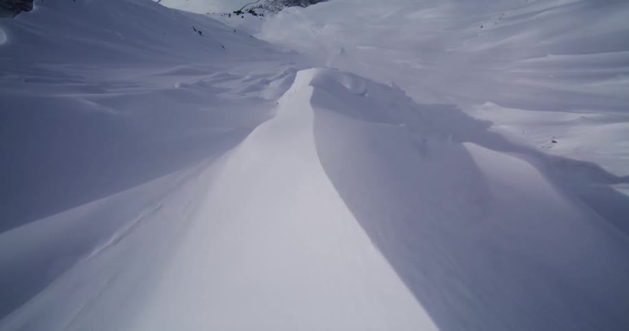 Heavy snow covers the landscape
