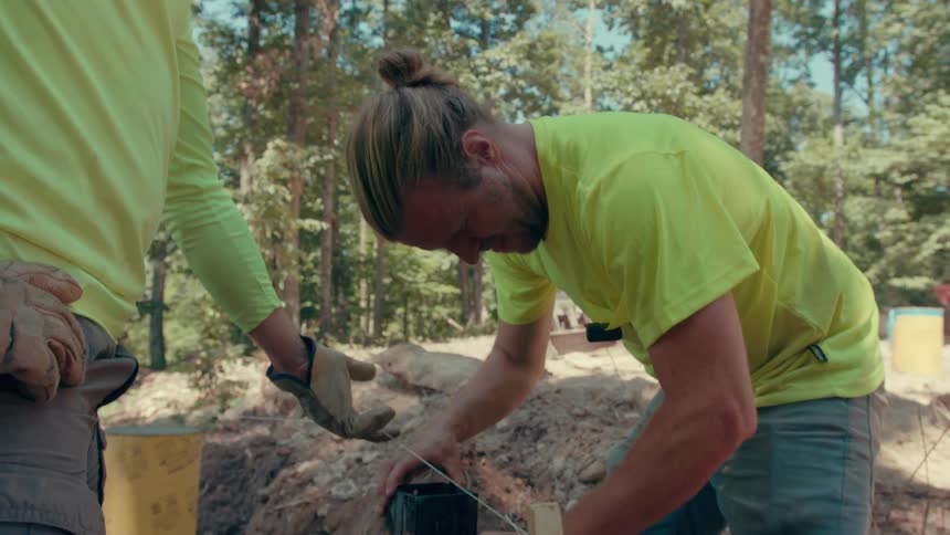Two construction workers outdoors