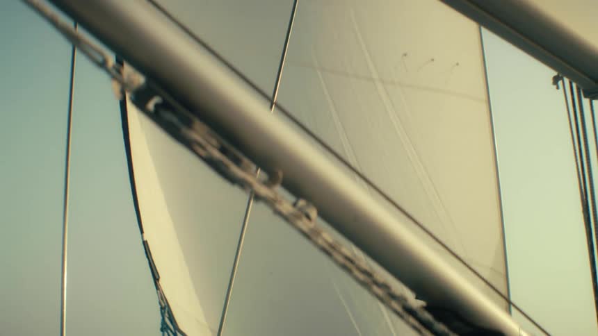 Wind blows the sail on the boat
