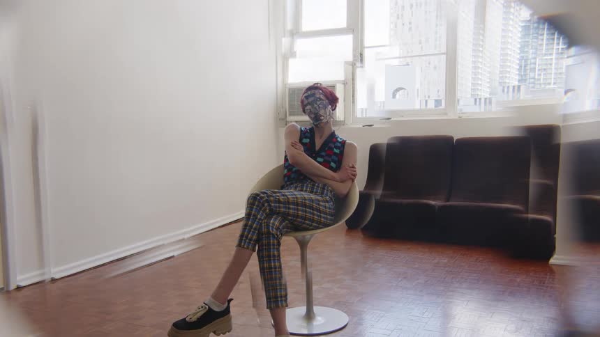 A woman sitting in a room