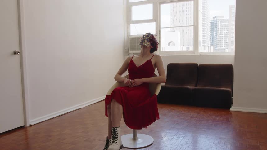 A woman sitting in a room