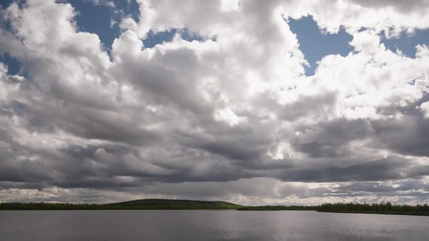 Clouds move across the summer skyline