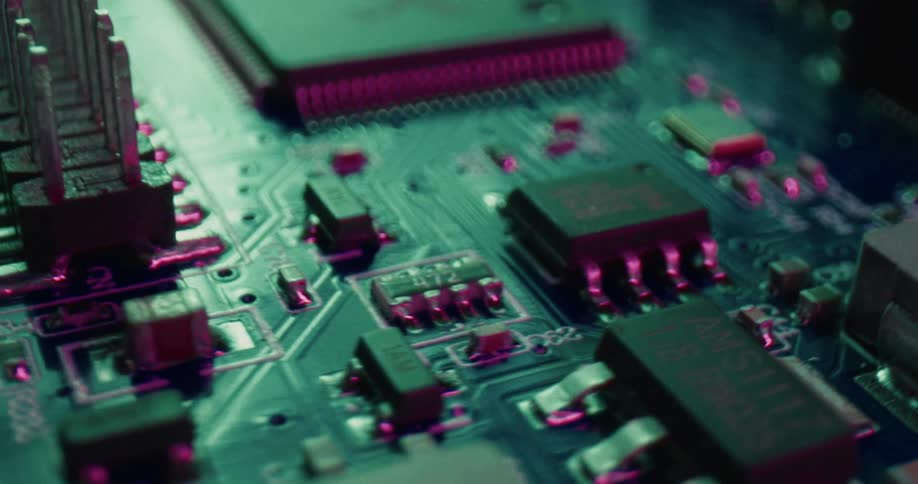 Closeup of several different components embedded on a printed circuit board