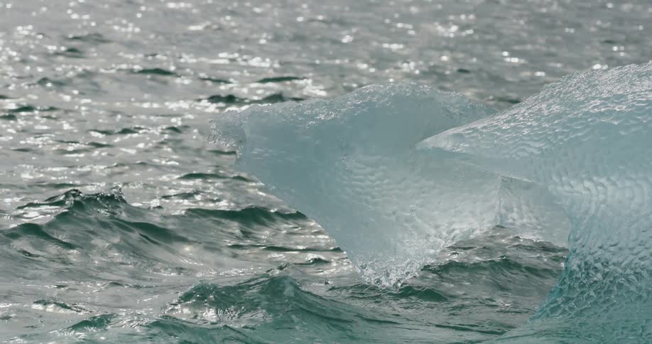 Melting ice floating on the water