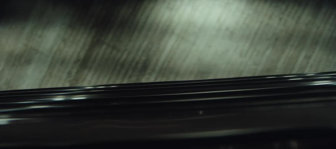 People on an escalator in an indoor space