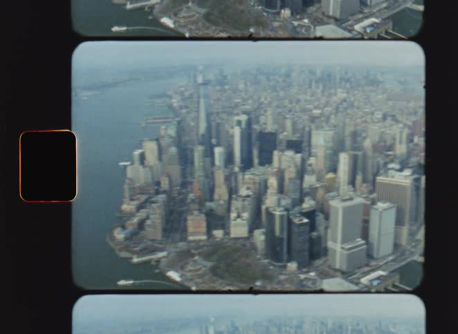 Lower manhattan seen from above with prominent skyscrapers and waterfront areas