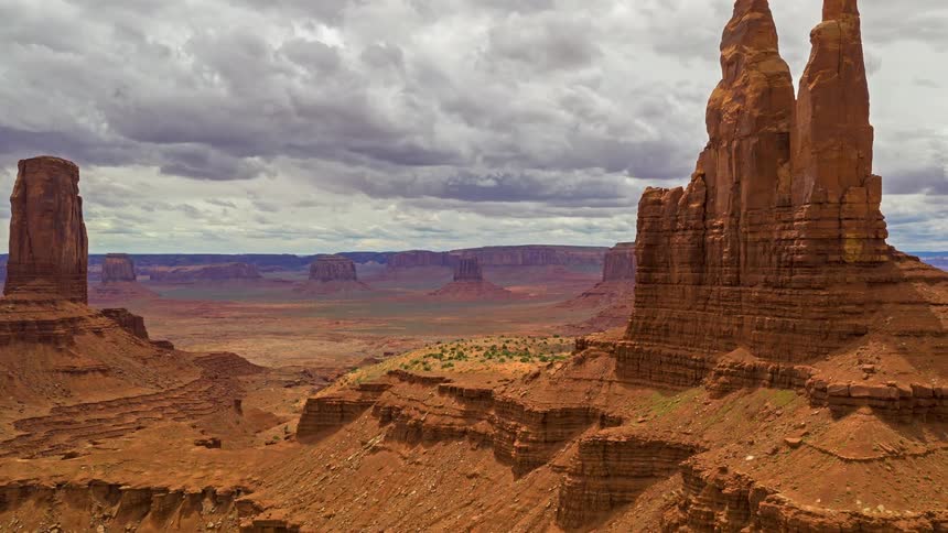 The large clouds flow over the canyon