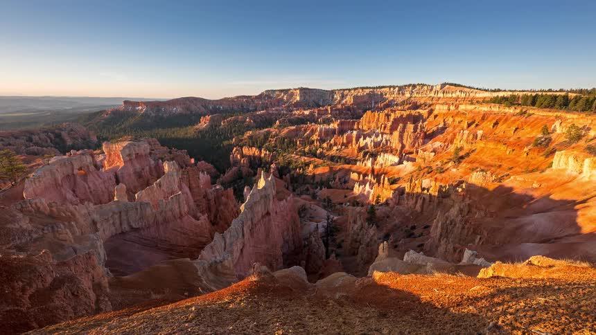 Red rock canyons and rock formations across the landscape