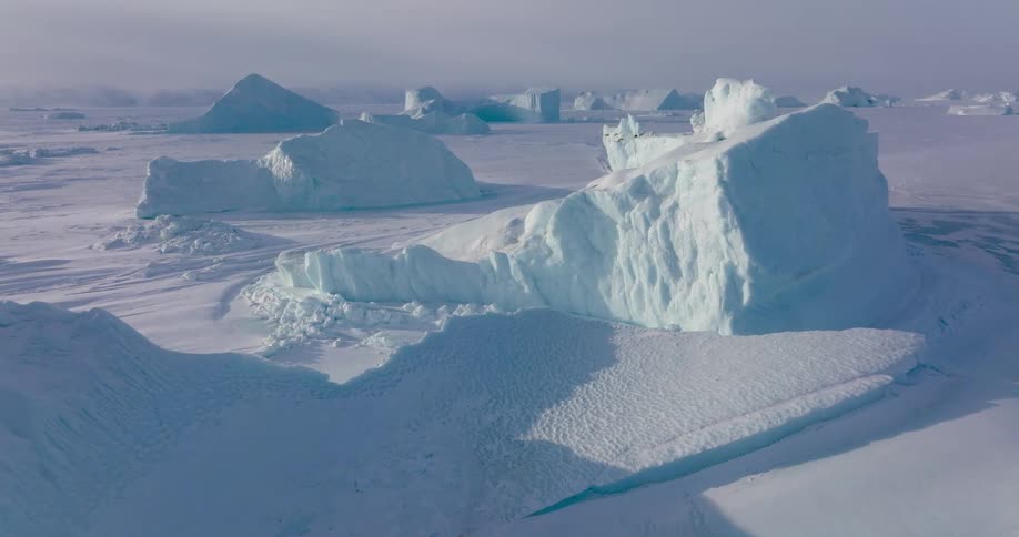 Large icebergs cover the landscape