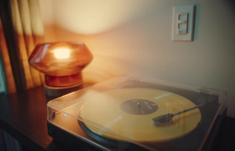 A record player rotating in a room