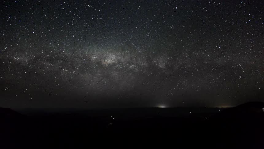 Stars of the milky way galaxy move across the night sky