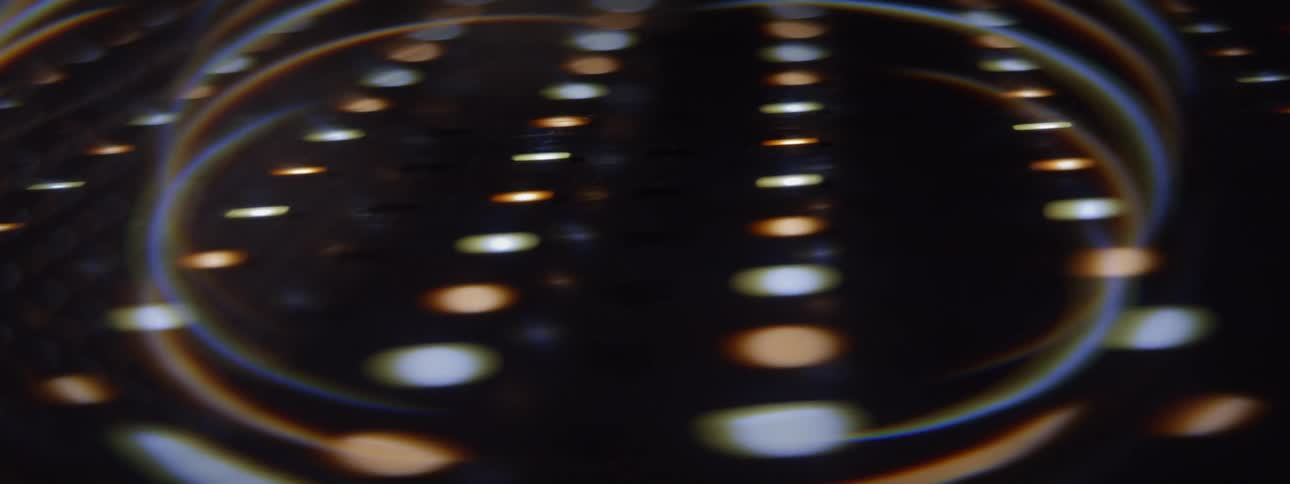 A close up of blue and gold digital lights