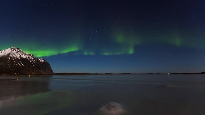 The aurora flashes over the stars