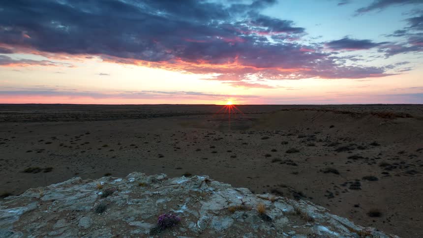 Sun rises over the desert