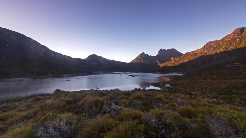 A time lapse of a lake in a mountian area