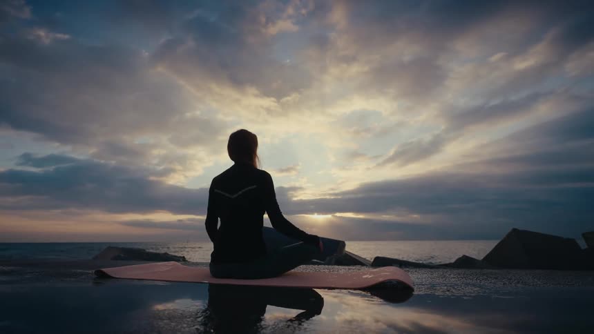A woman stretching and doing yoga