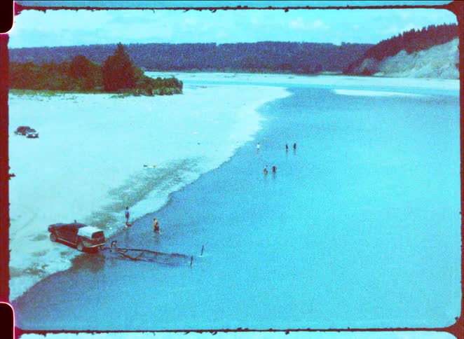 A view of people playing along the coast