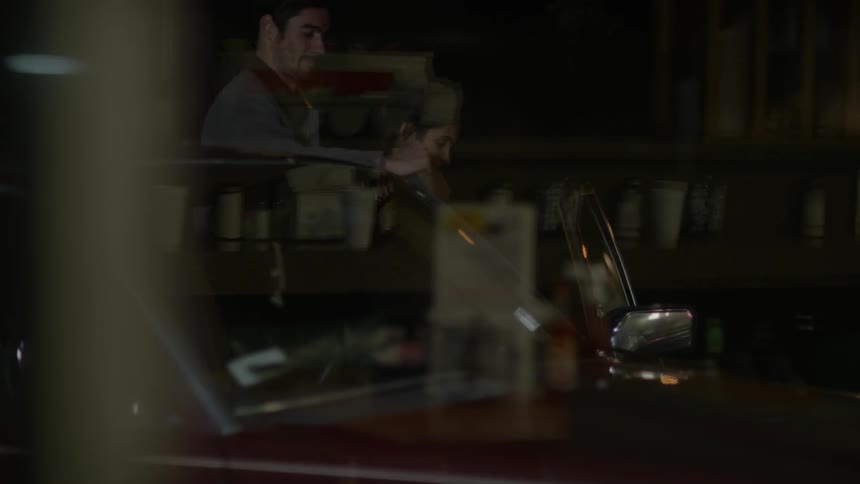 A man opens the door for his date