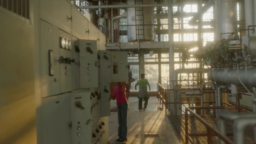 A group of children are exploring an abandoned factory